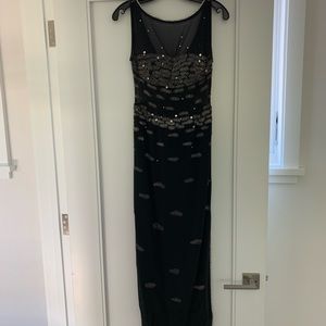 Sleeveless beaded rhinestone-trim gown side slit